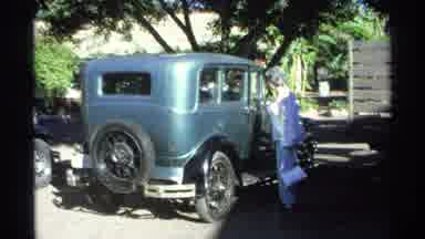 Guaymas Mexico (1975): Woman Wearing White Shirt Looks At Turquoise
