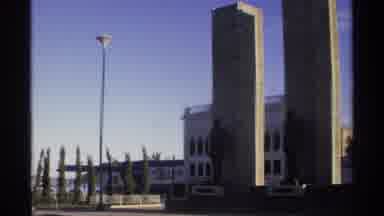 Guaymas Mexico (1975): Tall Buildings Large Metal Statues Statues Lean Against