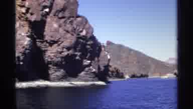 Guaymas Mexico (1975): Fishing Boat Rocking On Water Besides Huge Rocks