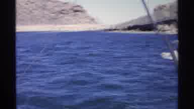 Guaymas Mexico (1975): A Single Boat Among The Huge Boats Going Forward In A