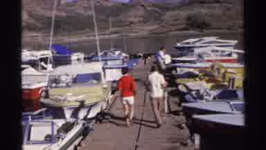 Guaymas Mexico (1975): Three People Walking Down Wooden Pier Plank On A Bright