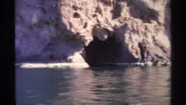 Guaymas Mexico (1975): Some Caves At The Waterline Of A Rocky Cliff As Seen From