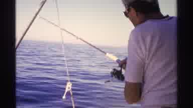 Guaymas Mexico (1975): Man Trying To Catch A Fish On His Boat