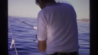 Guaymas Mexico (1975): A Man Very Happily Enjoying To Catch Fish In The Sea Using