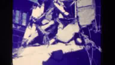 MANILLA PHILIPPINES--1944: Camera Pans Up A Pile Of Rubble From The Building That