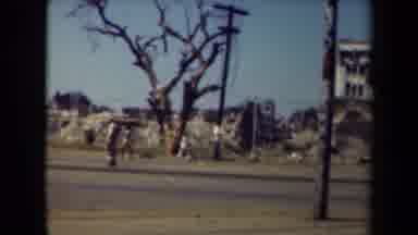 MANILLA PHILIPPINES--194: Civilians And Workers Walking Down A Road Near Old