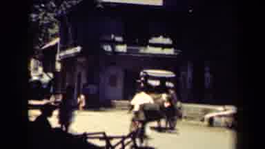 MANILLA PHILIPPINES--1944: The Town Is Filled With Horse Drawn Carriages And