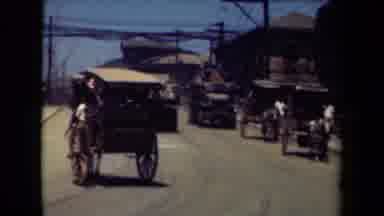 MANILLA PHILIPPINES--194: Mixed Traffic View Of Horse Drawn Buggies And Grey