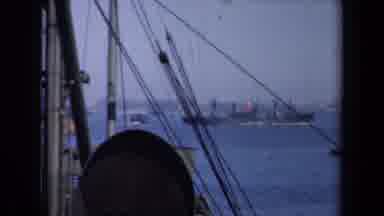 New York--1946: Cargo Ship and Tugboat in Harbor
