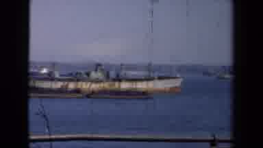 NEW YORK--194: View Of Old Rusty Ships In Water On A Clear Sunny Day
