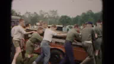 FREDERICK MARYLAND-deri: Boy Scouts Are Moving The Wheel Cart Towards Their Camp