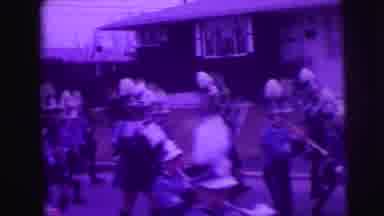LYNBROOK NEW YORK-broo: Band With Trumpets And Festive Hats Marching Down The
