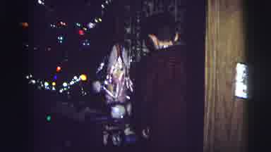 MOBILE ALABAMA-ile-: Baby Finding Presents Under A Christmas Tree And Another