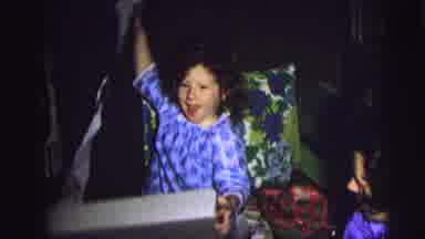 MOBILE ALABAMA-ile-: Happy And Excited Little Girl Opens Her Christmas Gift