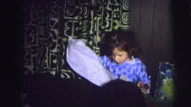 MOBILE ALABAMA-ile-: Children Open Their Gifts Enjoying The Holiday From Home