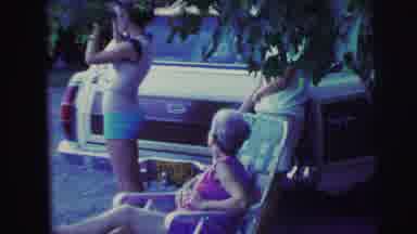 Mobile Alabama-ile-: Grandma Watches Daughter Using Binoculars Near Station Wagon