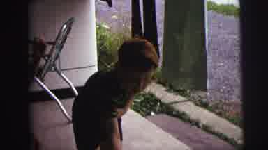 MOBILE ALABAMA-ile-: A Group Of Family Boys Are Playing In The Veranda Of The