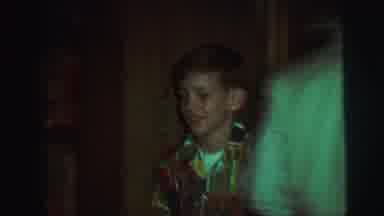 AUGUSTA GEORGIA-usta: Boy Wearing Red Pajamas Hangs Christmas Stocking On Mantle