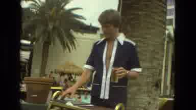 LAS VEGAS NEVADA--veg: A Young Man Enjoys His Glass Of Drink Outside His Home