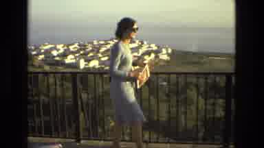 Andalusia Spain (1978): Woman Walking On Balcony With Coastal Views Brief Showing