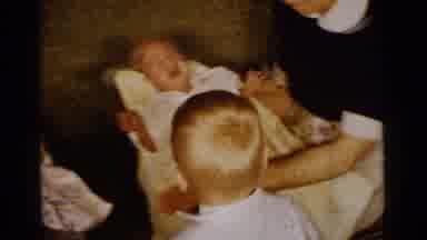 Gary Indiana USA-1961: Two Newborn Babies Crying While a Young Boy Watches