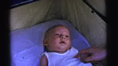 Gary Indiana USA-1961: Newborn Baby in Crib with Gentle Hand Touch