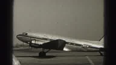 Harrisburg Penn (1946): A Flight Landed In The Runway At The Airport A Man Guides