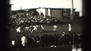 Harrisburg Penn (1946): A People Playing Games In A Ground And People Aching