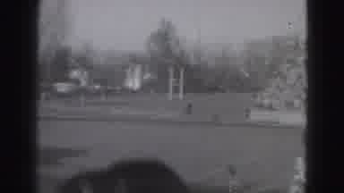 Harrisburg Penn (1946): A Man Covers The View In The Rugby Ground The Players Are
