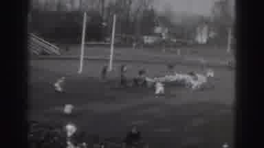 Harrisburg Penn (1946): Youngsters Are Playing Football In An Open Ground