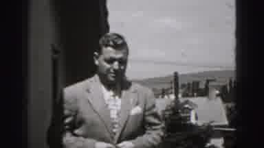 New Cumberland Penn (1946): Middle-Aged Man Standing Outside The House Buttoning