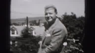 New Cumberland Penn (1946): A Man Enjoys His Ride And Nicely Dressed With Around
