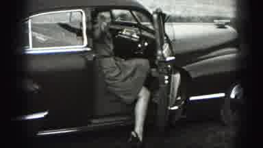 New Cumberland Penn (1946): Pretty Young Woman Gets Into Classic Car Waving