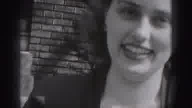 New Cumberland Penn (1946): Smiling Woman With Short Dark Hair Talking With Young
