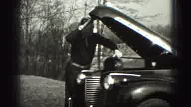New Cumberland Penn (1946): Man Fixing His Car Putting Oil