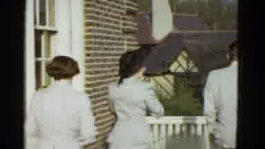 Boston Mass (1951): Woman Wearing Black Hat Walks To Man Wearing White Suit On A