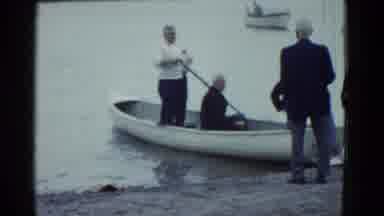 Boston Mass (1951): A Boat Was Filled With Man And The Persons Moving The Place