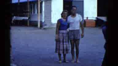 Boston Mass (1951): Two Men Wearing Blue Shorts Dive Into Lake From Wooden Pier