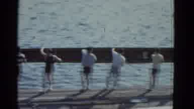 Boston Mass (1951): Group Of Men Put The Long Rowing Boat On The Water