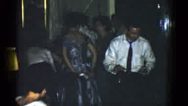 Boston Mass (1951): Guy Walking At A Party Holding A Glass And A Bottle Of