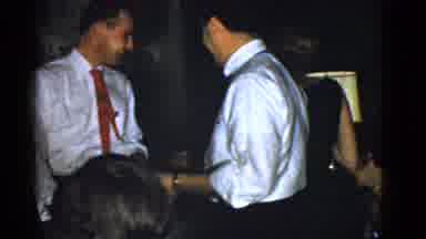 Boston Mass (1951): Man Wearing Red Tie Shakes Hands With Man Wearing Black And