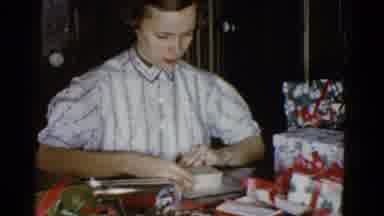 Boston Mass (1951): Woman Sits At Table And Wraps Christmas Present Other Wrapped
