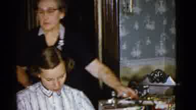 Boston Mass (1951): Woman Smiling By Making Gifts In An Old Color Video