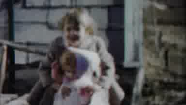 Cheyenne County Kansas-1958: A Little Girl Playing With A Baby Doll On A Porch