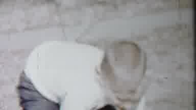 Cheyenne County Kansas (1958): A Young Boy Is Touching The Ground With His Hands
