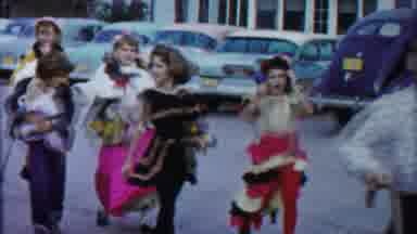 Cheyenne County Kansas (1958): People In Their Costumes Walk In The Street