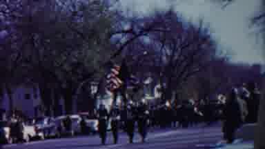 Cheyenne County Kansas (1958): Marching Band Carrying An American Flag
