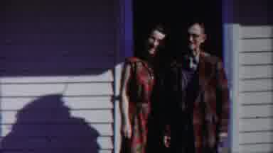 Cheyenne County Kansas (1958): Couple Stands On Doorstep Faces the Camera