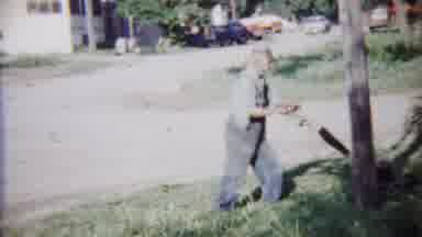 Saint Francis Kansas (1958): A Sweeper Cleaning The Road Side With Slates Machine