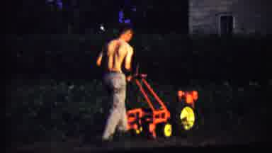 Saint Francis Kansas (1958): A Man Clears The Grass In The Park With His New Grass